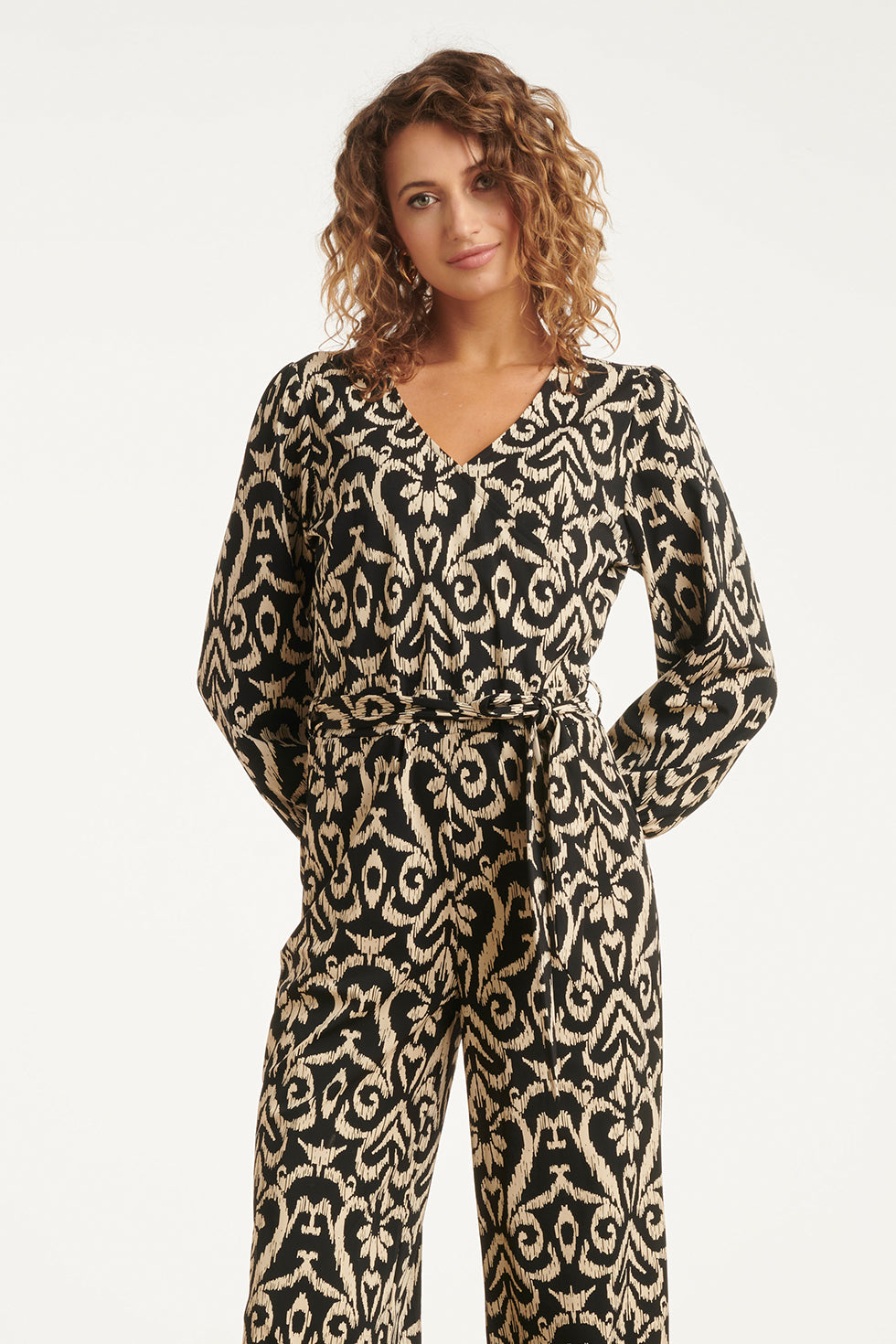 25819 – Smashed Lemon travel jumpsuit met Aztec-print | Black - Sand