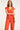24083 Lange Aansluitende Jumpsuit | Coral