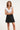 24175 Te Top Met Speelse Ruches Palmboom Borduursel | White - Black