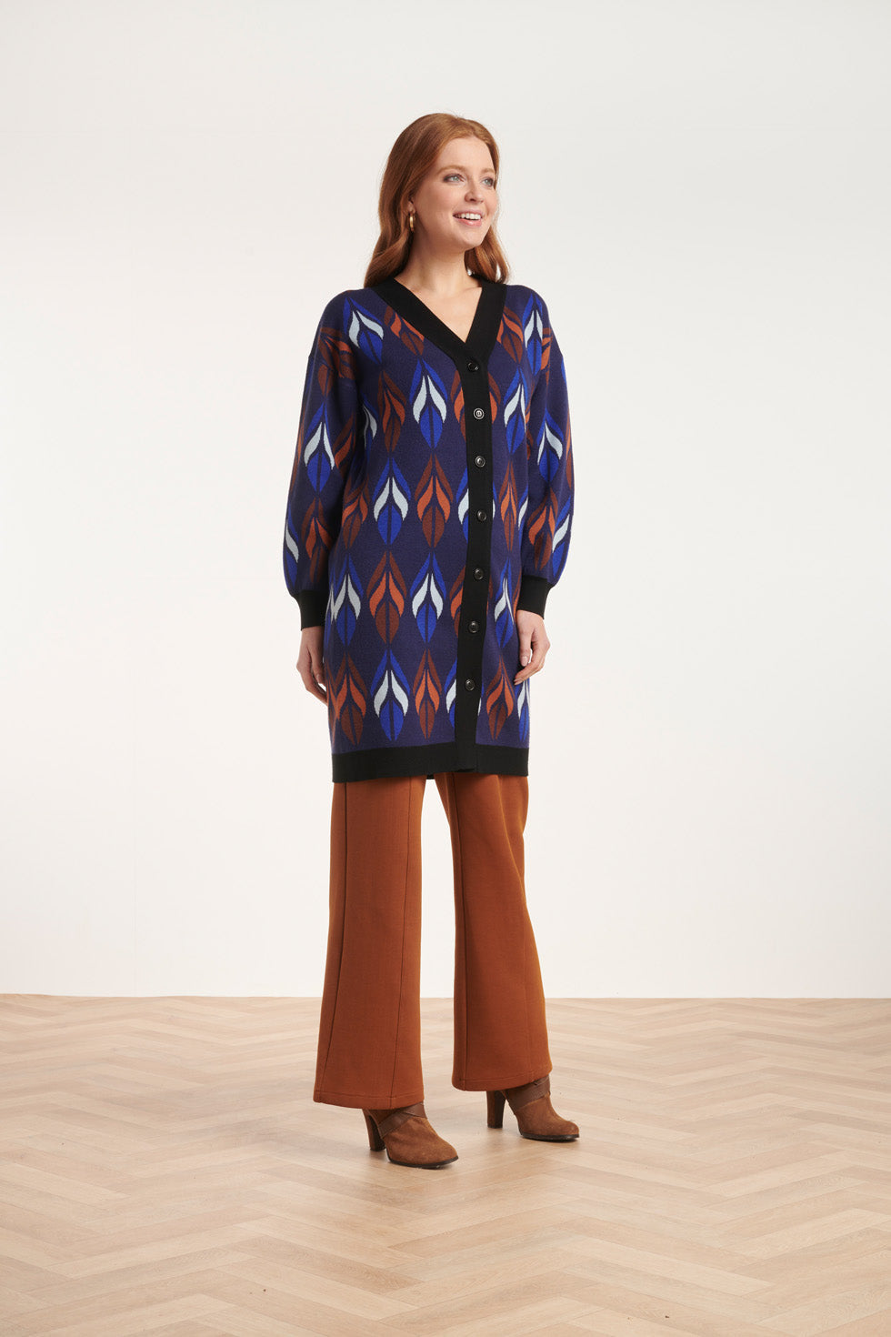 24613 Gebreide Vest Met Bladeren Print | Blue-Brown