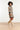 25736 – Smashed Lemon Gebreide jurk met golfdessin | Black - Sand