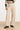 25759 – Smashed Lemon PU broek met rechte pijp | Sand