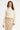 Off white kleurige Coltrui met Geborduurde Lijndetails | Off White - Sand