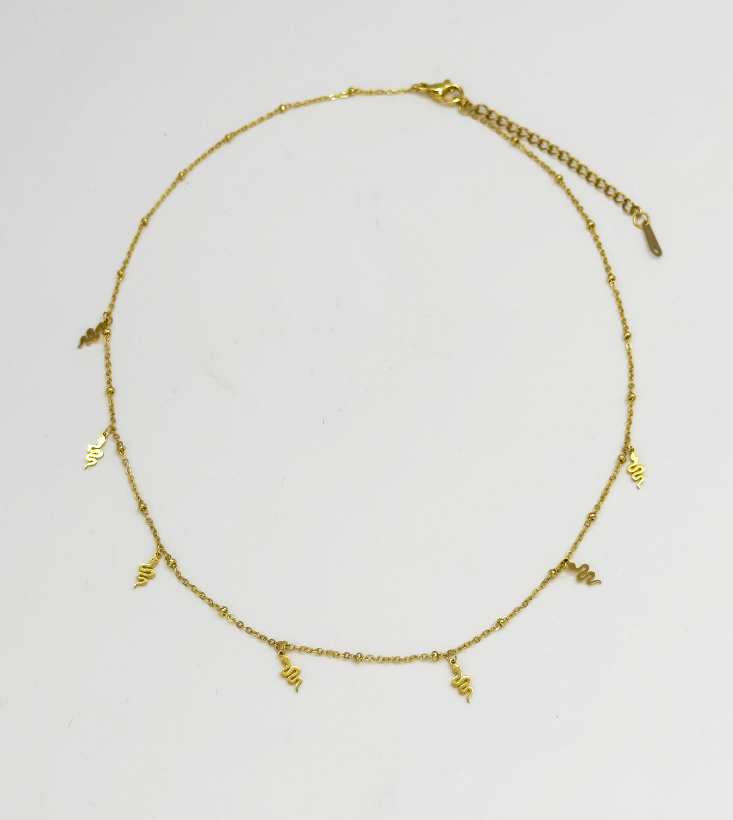 64045 Fijne Roestvrijstalen Ketting Met Slangvormige Hangers | Gold