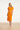 Dames Jurk Met Strikceintuur En Golvende Details | Light Orange - Sand