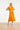 Dames Jurk Met Strikceintuur En Golvende Details | Light Orange - Sand