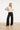 Gestreepte Top Met Ingeweven Structuur En Verstelbare Zoom | Off White - Black
