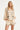 Off White Blouse Met Zwarte Borduursels En Strikkoord | Off White - Black