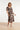 Smashed Lemon Crème Jurk met Bruine Abstracte Print en Tailleceintuur | Off White - Brown
