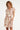 Smashed Lemon Jurk met Abstracte Print en Tailleceintuur in Zalmkleur | Off White - Sand