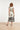 Smashed Lemon Witte Maxi Jurk met Zwarte Bladerenprint en Gestreepte Zoom | Black White