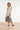 Smashed Lemon Witte Maxi Jurk met Zwarte Bladerenprint en Gestreepte Zoom | Black White