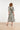 Smashed Lemon Zwart-Witte Jurk met Tropische Print en Strikdetail | Black White