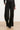 Wijde pantalon met paillettenbies en strikkoord | Black