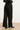 Wijde pantalon met paillettenbies en strikkoord | Black